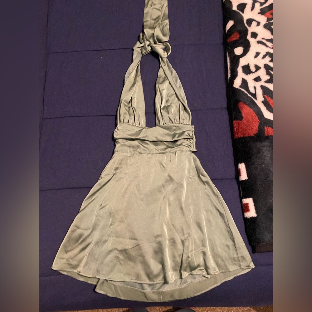 Never worn lucky in the sky backless green dress.